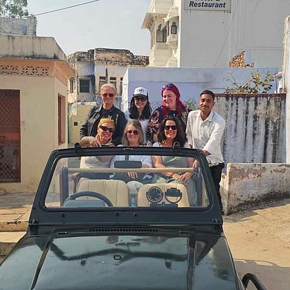 Rebekah enjoying her tour of India with her travel companions and clients