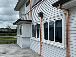 copper downpipes on Hamilton home by Fine Line