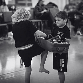 Kickboxing fitness class with guard up