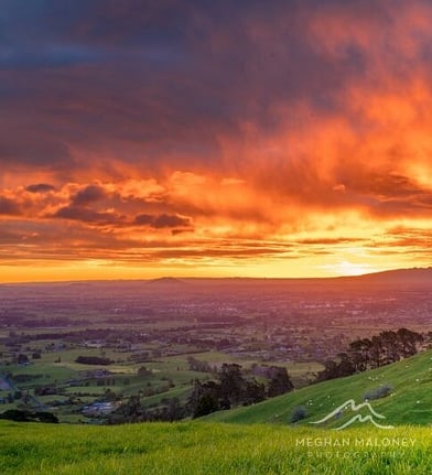 Vivid orange and pink sunset colours over Cambridge countryside