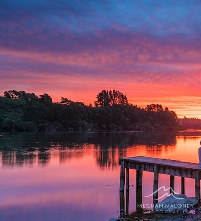 Jetty on a lake at sunset near Cambridge, New Zealand