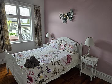 One of the five generous bedrooms at Villa Rosa