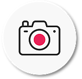 Icon of a camera with a pink lens, framed within a white circle, with "Photography & Videography" text below