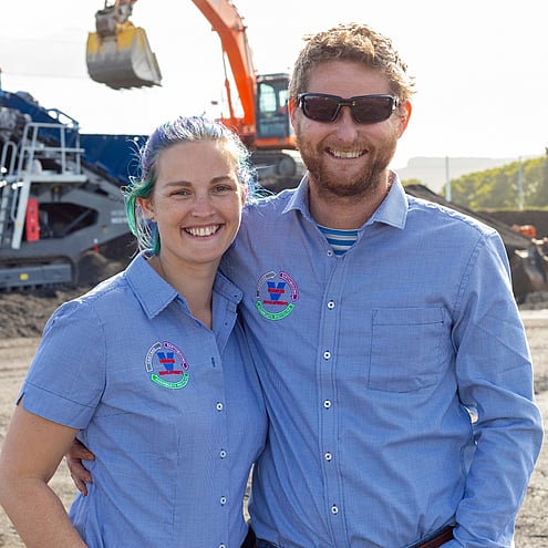 Cam and Becky Vernon together  with the aggregate recycling machinery working in the background