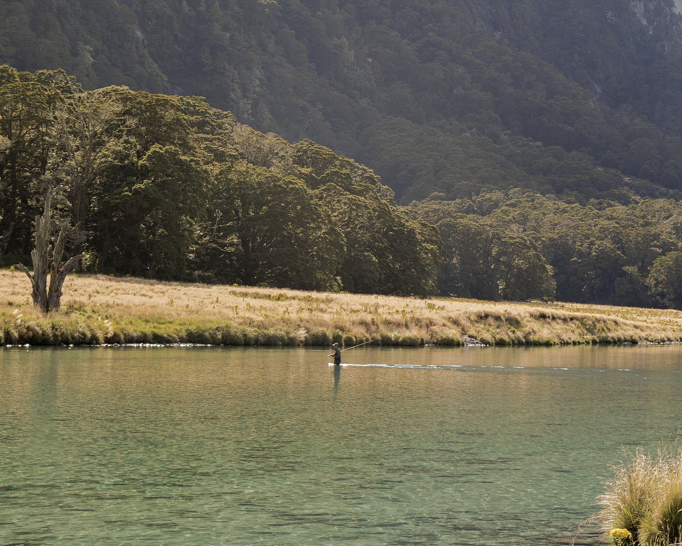 Wet wading in paradise, summertime bliss.  Vali love Todd Adolph 