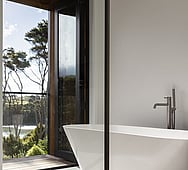 designer bathroom with Raglan estuary view – Nixon Homes