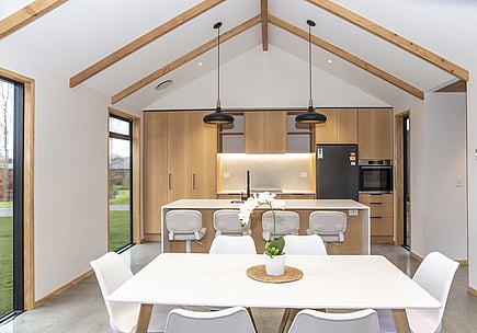 Kitchen and dining area with raking ceiling &ndash; Waikato rural build