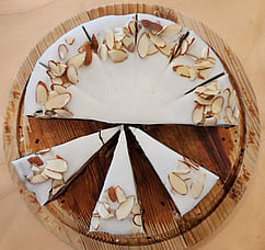 Nantain, a French classic. almond meal makes this cake nutty, chocolate chips for richness and a rum icing for intensity.