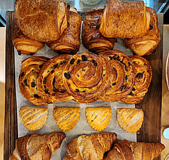 French pastries, cooked to perfection. croissants, pain au raisins, apple turnovers and pain au chocolate. 