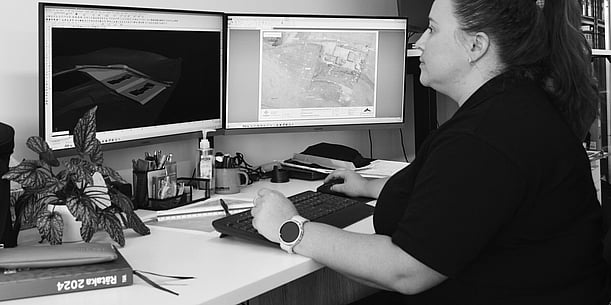 Hands using a laptop computer