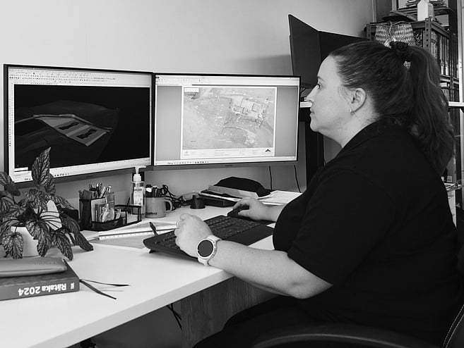 Hands using a laptop computer