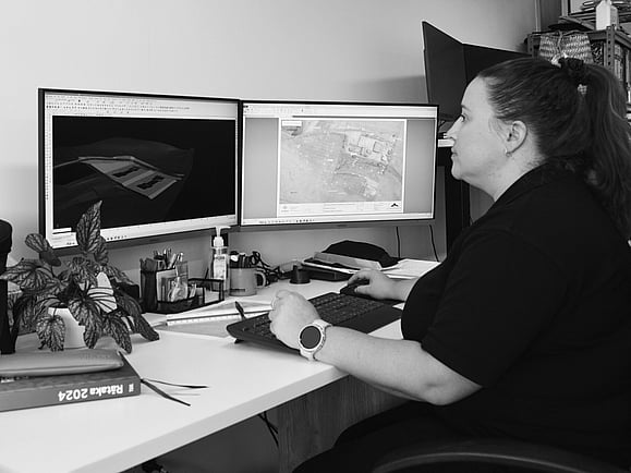 Hands using a laptop computer