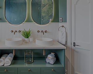 Image of heritage home bathroom in deep green and white renovated and restored by Whitechurch Construction, Waikato residential builders.