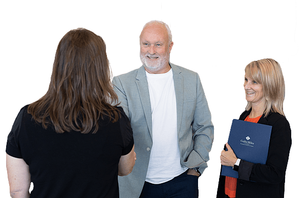 Gallie Miles has been in business for more than 30 years. Image of Bryce Bluett and Shelley Greer greeting a client. 
