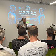 People networking and socialising at a sustainability-focused community event