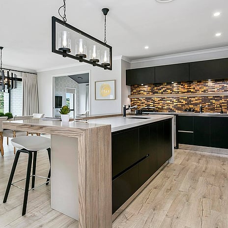 Image of modern tiled kitchen back splash. Tiling service by Cosmic Tiling for A1 Homes. Waikato.