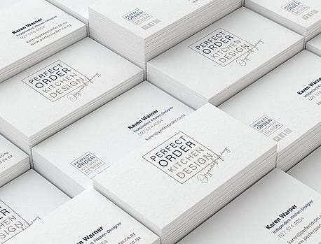 Logo Design on Printed Business Card | Wellington Logo Designer