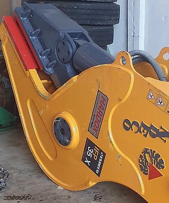a brand new Italian designed and manufactured Indeco brand hydraulic IFP 35x fixed pulverizer on floor of  warehouse