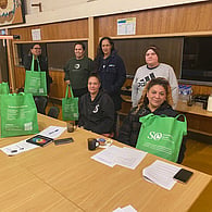 Community members participating in a wellbeing and environmental education session