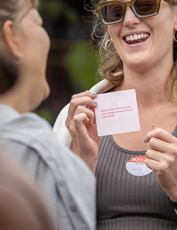Event photo of two women laughing during an icebreaker activity at Linkedin Local networking event in Tauranga, NZ