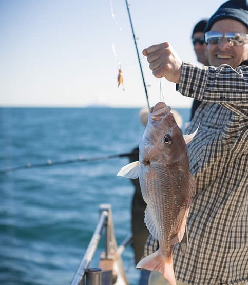 Happy fisherman