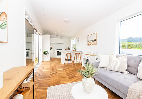 Wide angle view of the living room and kitchen
