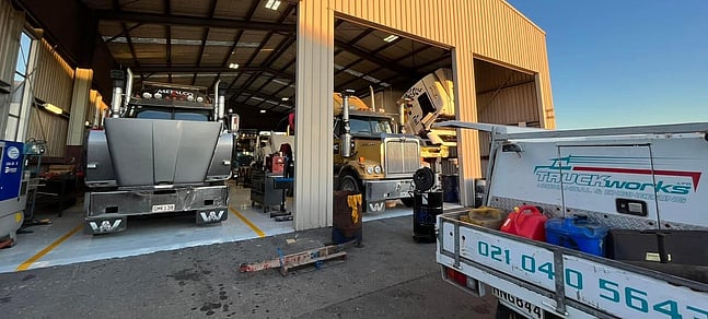 Photo of several trucks parked in Truckworks Mount Maunganui workshop