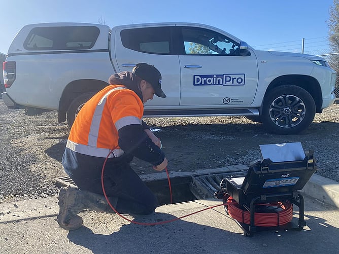 Drainpro crew checking drain