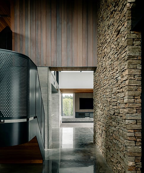 Ardent Building Developments. Hamilton, Waikato. NZ. Image of new home interior with stairwell and stone wall