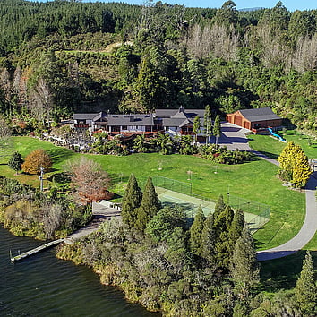 Large home surrounded by countryside