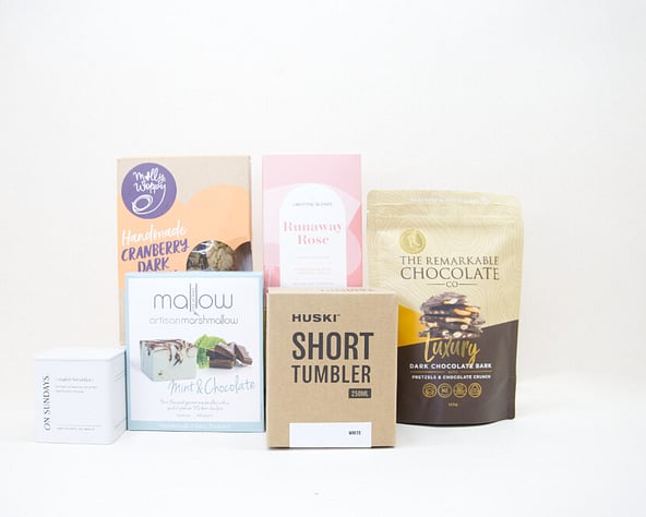 nz tea, coffee cup and sweet treats