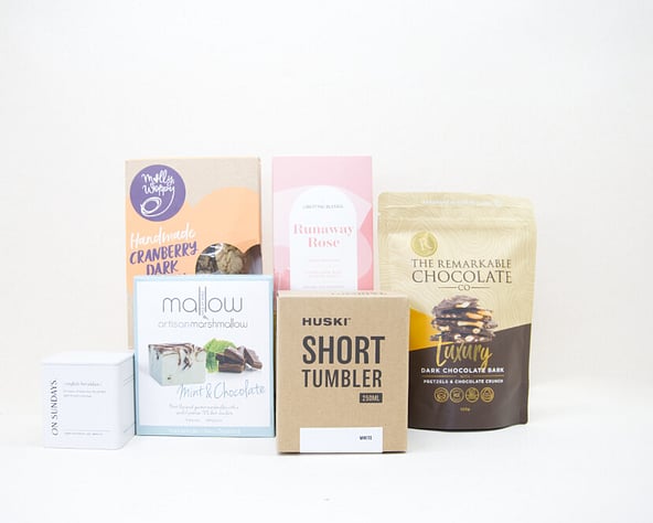 nz tea, coffee cup and sweet treats