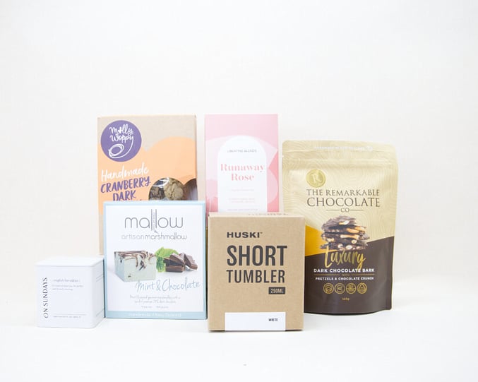 nz tea, coffee cup and sweet treats