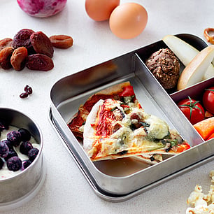 Editorial photography for Living Lightly book by Nicola Turner pizza in metal lunchbox 