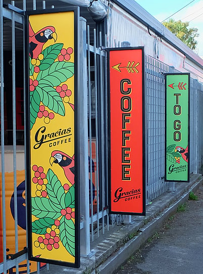 Gracias sidewalk signage