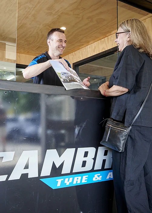 Cambridge Tyre and Alignment - Meeting customer at reception desk