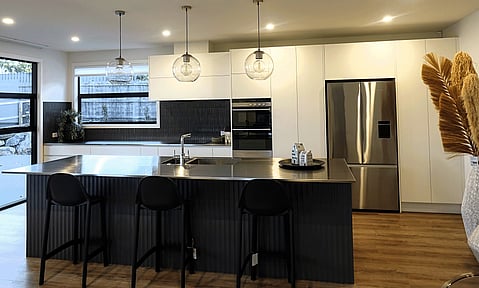 Contemporary kitchen sink area, integrating style and functionality, designed by Barrett Joinery.