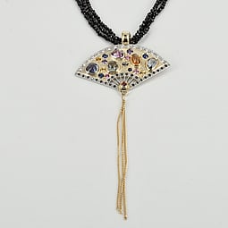 Handmade necklace of gold flowers, diamonds and a gold bee