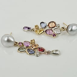 Handmade earrings of pearls, diamonds and pink sapphires
