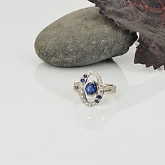 White gold, blue sapphires and diamond ring