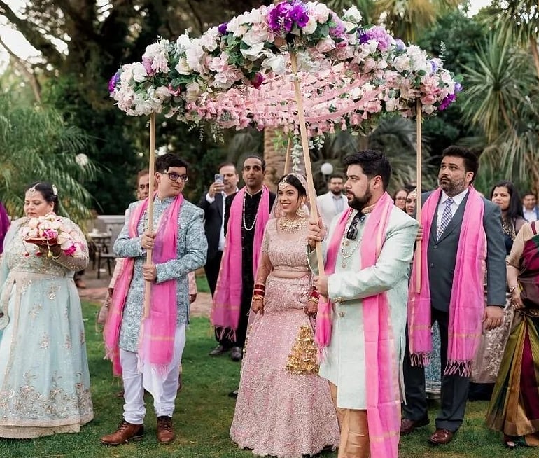 Traditional Indian wedding celebration in the gardens at Settlers Country Manor