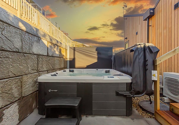 Private outdoor spa pool at a Roam Taupo unit
