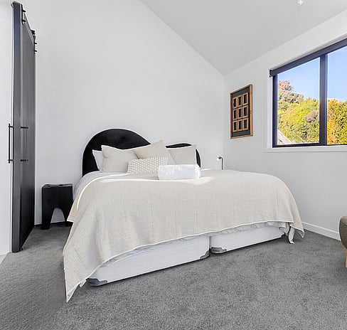 Super king bed in master bedroom at Roam Taupo