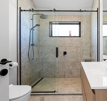 Modern bathroom with shower and toilet at accommodation in taupo new zealand