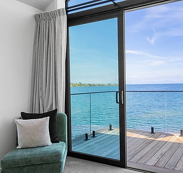 View of Lake Taupo from master bedroom at Roam Taupo