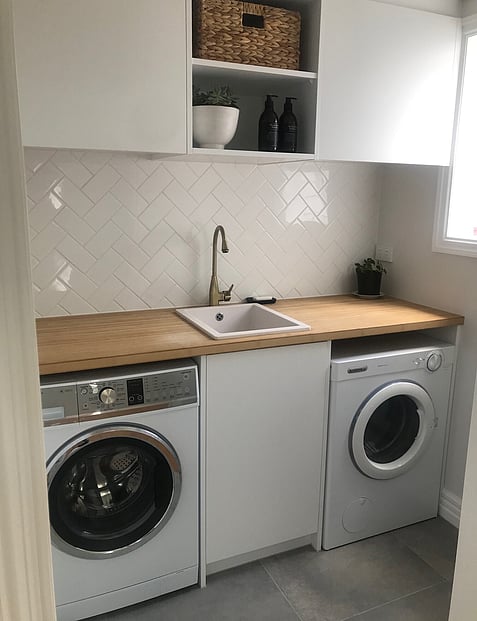Laundry Renovation with herringbone tiles