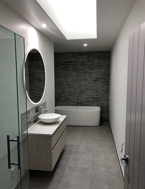Bathroom Renovation with freestanding bath and feature tiling