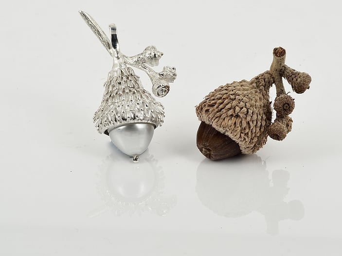 Silver cork oak acorn pendant with an Australian South Sea pearl. Sold