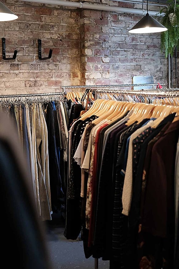 The cellar of clothes for Gray's in-store vintage shop