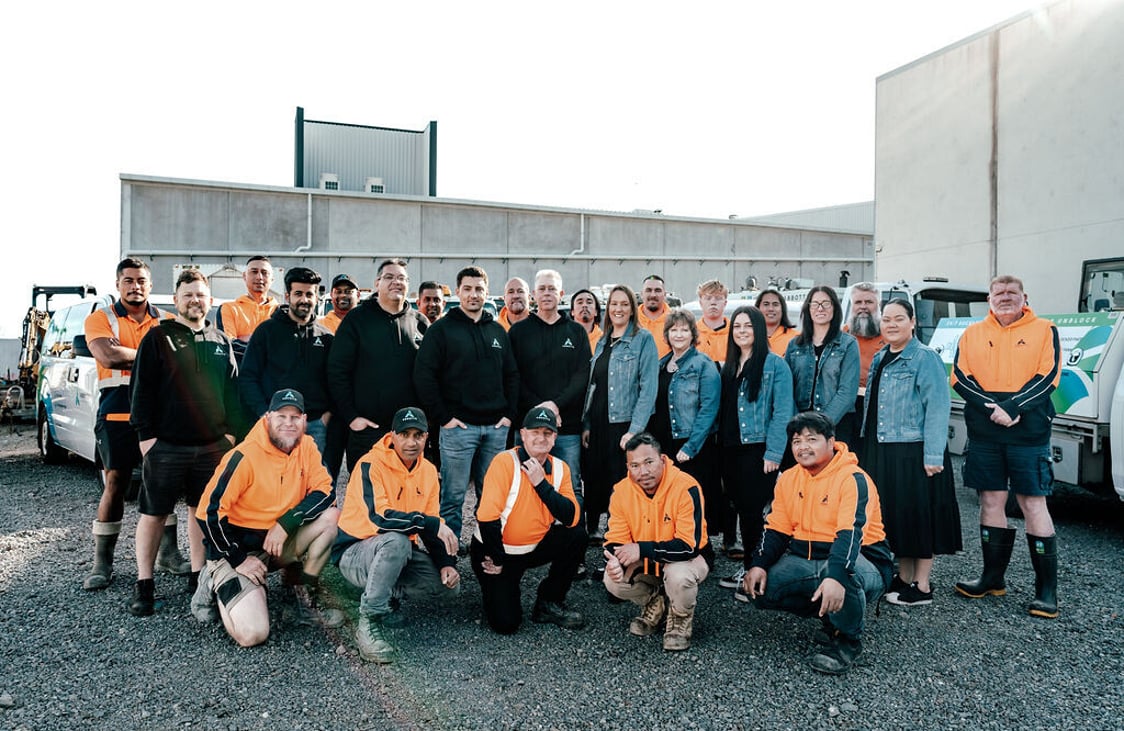The Abbotts team in front of their fleet of drainage and vacuum trucks